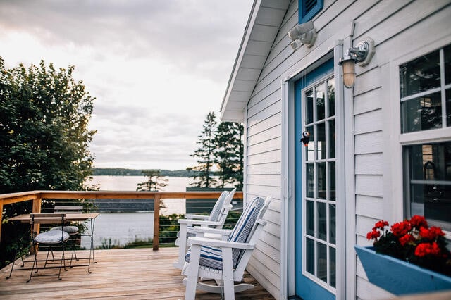 deck featuring a water view