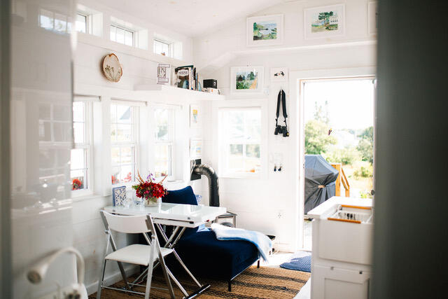 dining area featuring vaulted ceiling