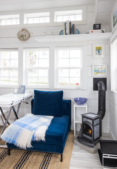 living area with a wood stove