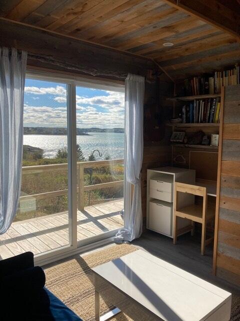 16 Monument St, Lubec, ME 04652 - office area featuring a water view, wooden ceiling, and wood walls