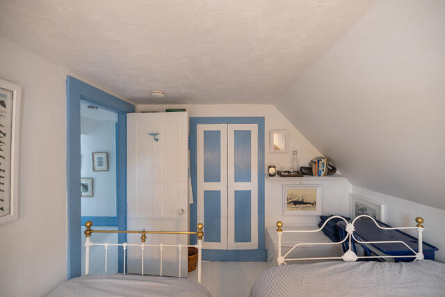 bedroom featuring vaulted ceiling