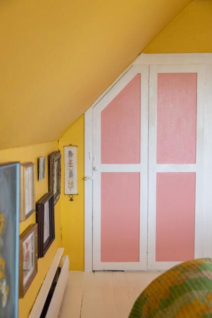 additional living space featuring lofted ceiling