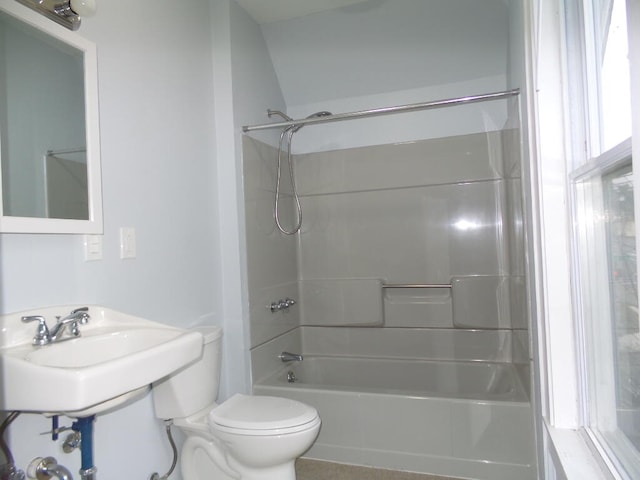 bathroom featuring  shower combination and toilet