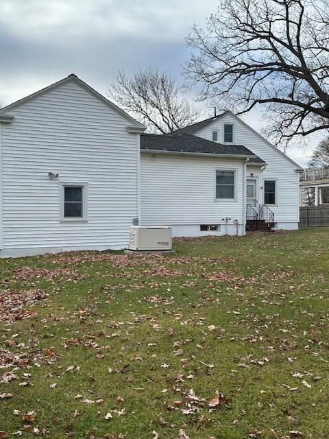 view of property exterior featuring a yard