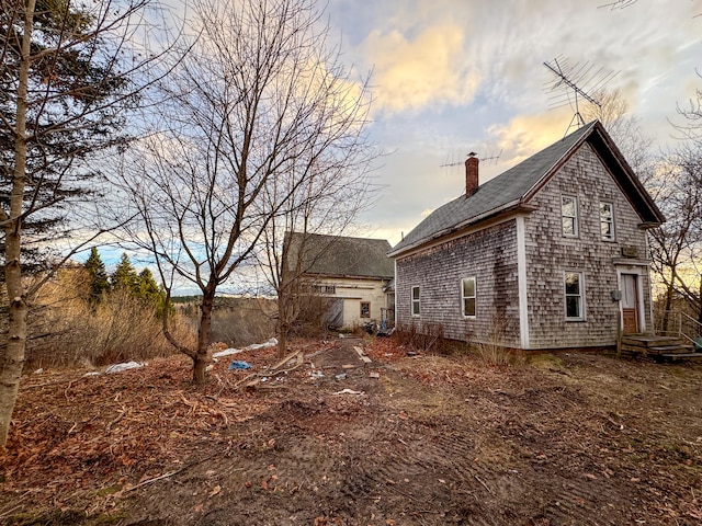 view of property exterior at dusk