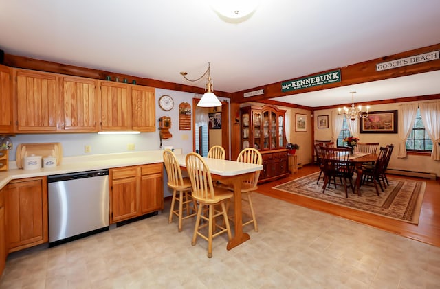 kitchen with light hardwood / wood-style flooring, stainless steel dishwasher, a chandelier, pendant lighting, and a breakfast bar