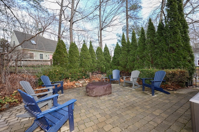 view of patio / terrace featuring an outdoor fire pit