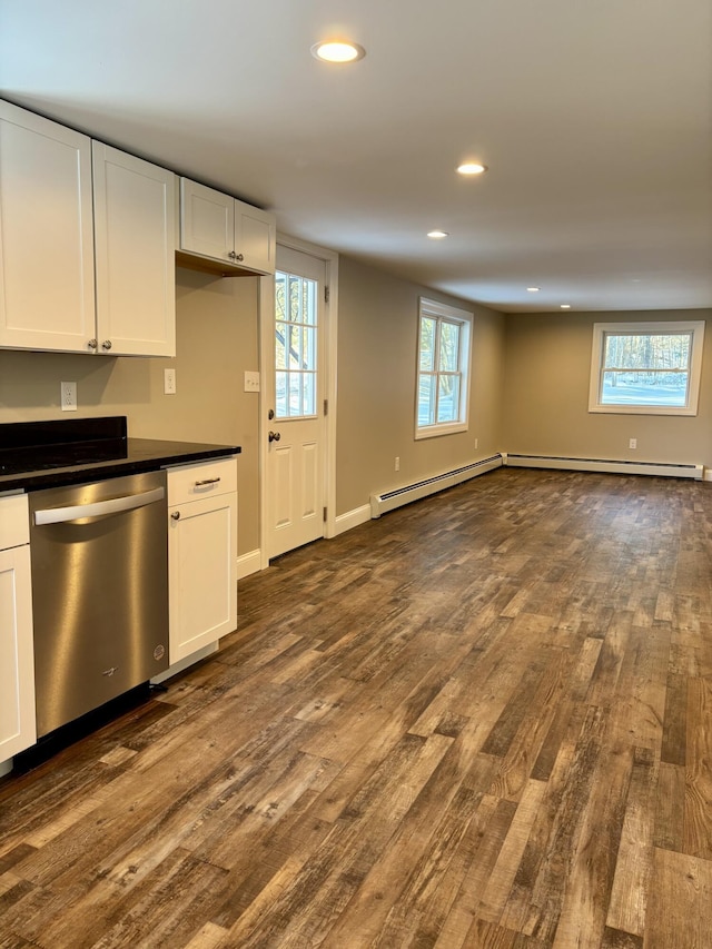 kitchen with dark countertops, white cabinetry, dark wood finished floors, and dishwasher