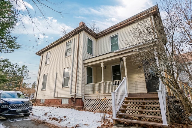 363 Broadway, Bangor, ME 04401 - view of front of property with a porch and a chimney