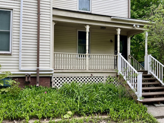 363 Broadway, Bangor, ME 04401 - doorway to property featuring a porch