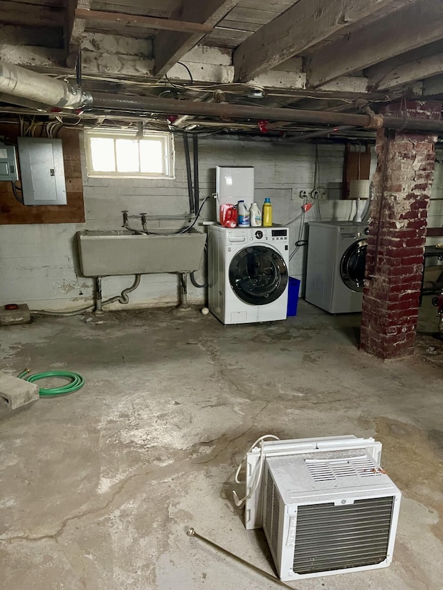 363 Broadway, Bangor, ME 04401 - below grade area featuring electric panel, independent washer and dryer, and a sink