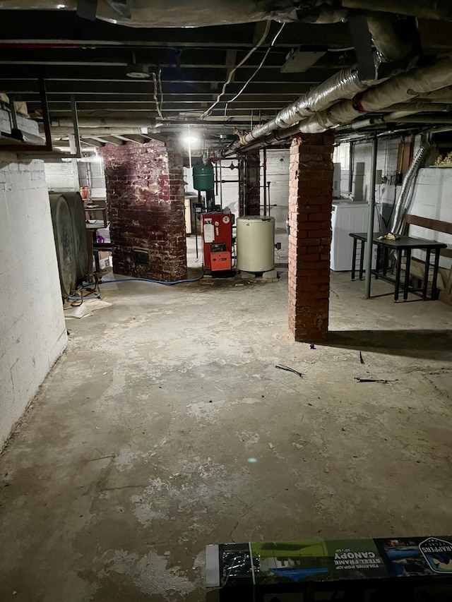 363 Broadway, Bangor, ME 04401 - unfinished below grade area featuring washer / dryer, water heater, and a heating unit