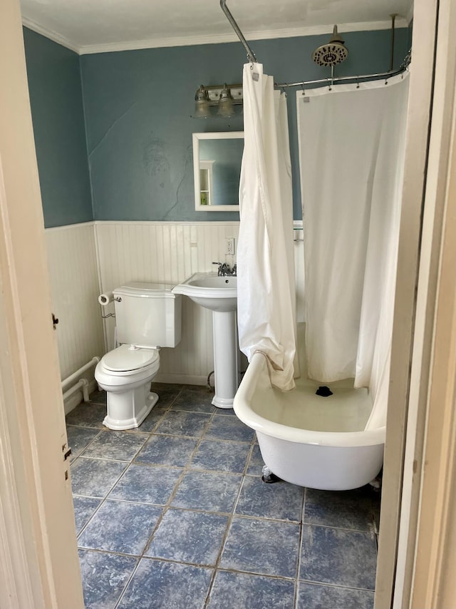 363 Broadway, Bangor, ME 04401 - bathroom featuring toilet, a shower with shower curtain, a wainscoted wall, ornamental molding, and a sink