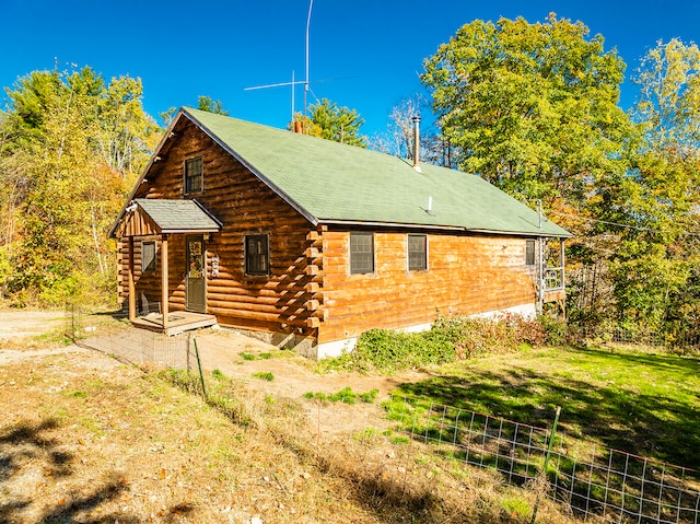 view of home's exterior featuring a lawn