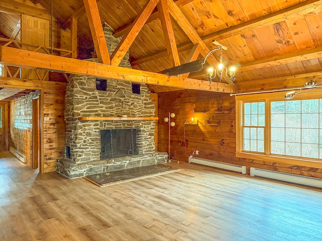 unfurnished living room featuring wooden ceiling, a stone fireplace, wooden walls, a baseboard radiator, and wood-type flooring