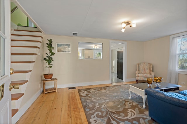 living room with light hardwood / wood-style floors