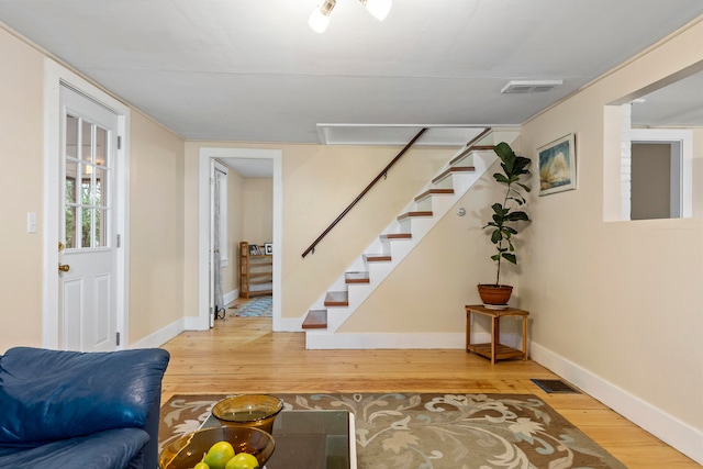 interior space with hardwood / wood-style flooring