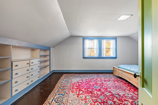 bedroom featuring vaulted ceiling