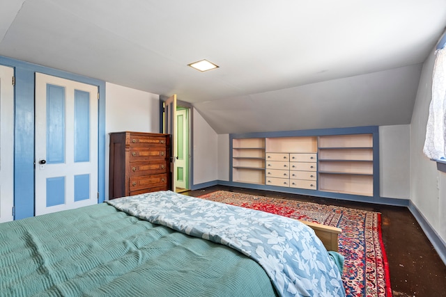 bedroom featuring vaulted ceiling