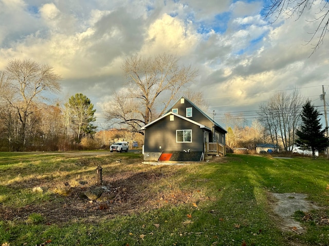 view of property exterior with a lawn