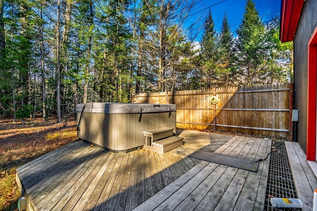 deck with a hot tub