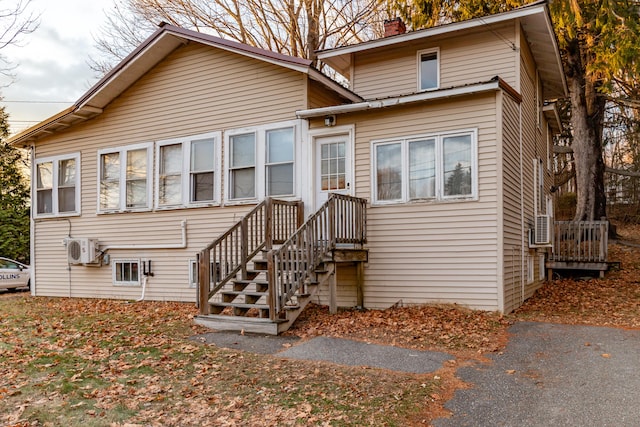 view of front of property with ac unit