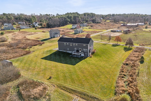 birds eye view of property featuring a rural view