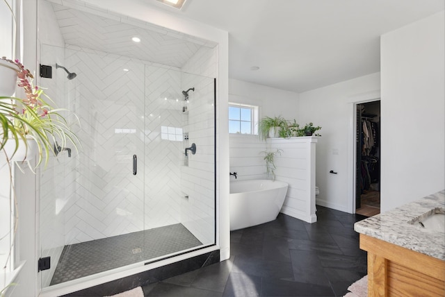 full bathroom featuring vanity, independent shower and bath, and toilet