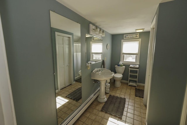 bathroom featuring tile patterned floors and toilet