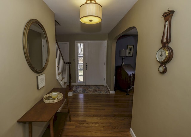 foyer featuring dark hardwood / wood-style floors