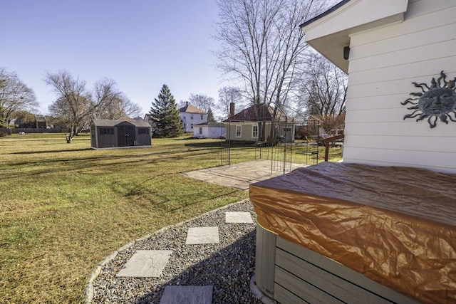 view of yard with a storage shed