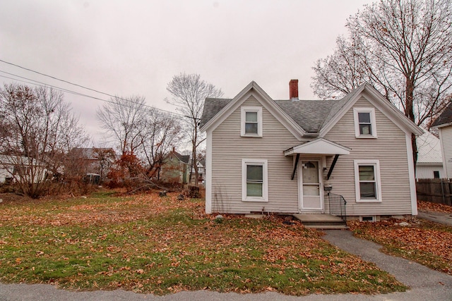 view of front of home with a front lawn