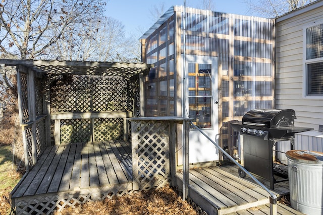 wooden terrace with area for grilling