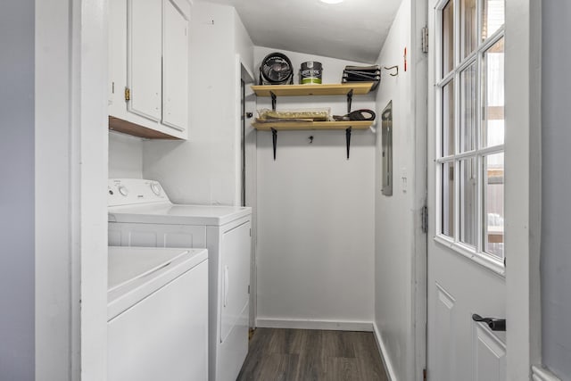 laundry area with washer and clothes dryer, cabinets, and dark hardwood / wood-style floors