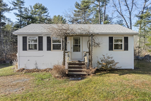 view of front of home with a front yard