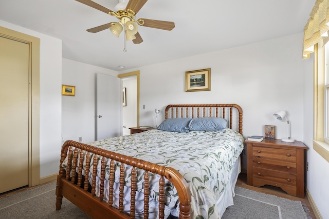 bedroom featuring ceiling fan and carpet floors