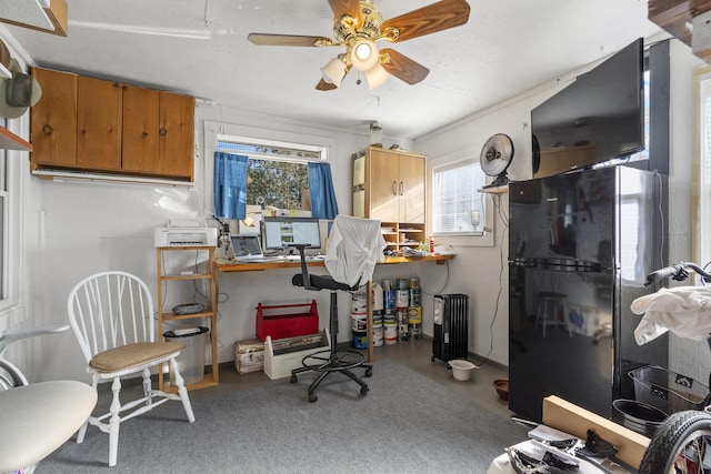 office space with concrete flooring and ceiling fan