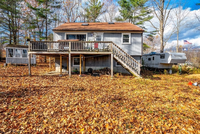 rear view of house with a deck