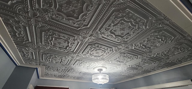 28 Maine Ave, Millinocket, ME 04462 - detailed view of an ornate ceiling and a chandelier