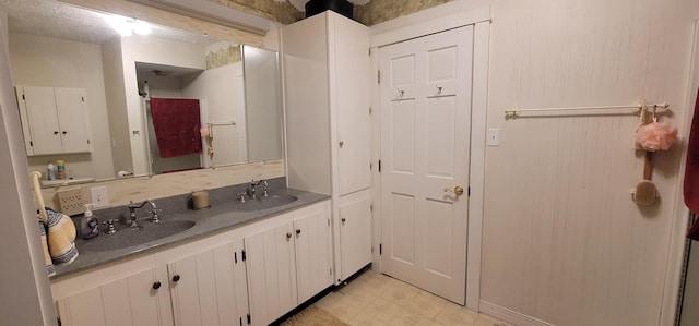 28 Maine Ave, Millinocket, ME 04462 - full bath with tile patterned floors and double vanity