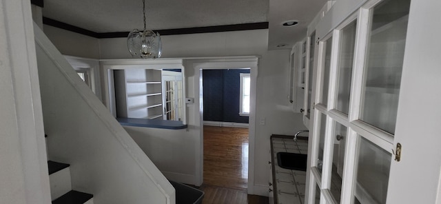 28 Maine Ave, Millinocket, ME 04462 - entrance foyer with wood finished floors and stairway
