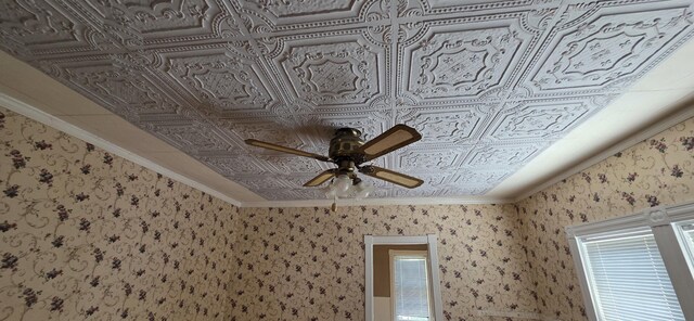 28 Maine Ave, Millinocket, ME 04462 - detailed view of ceiling fan, an ornate ceiling, and crown molding