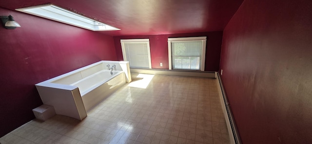 28 Maine Ave, Millinocket, ME 04462 - corridor with a skylight, tile patterned floors, and baseboard heating