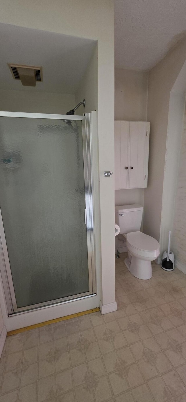 28 Maine Ave, Millinocket, ME 04462 - full bathroom with tile patterned floors and a stall shower