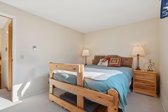 bedroom with light carpet