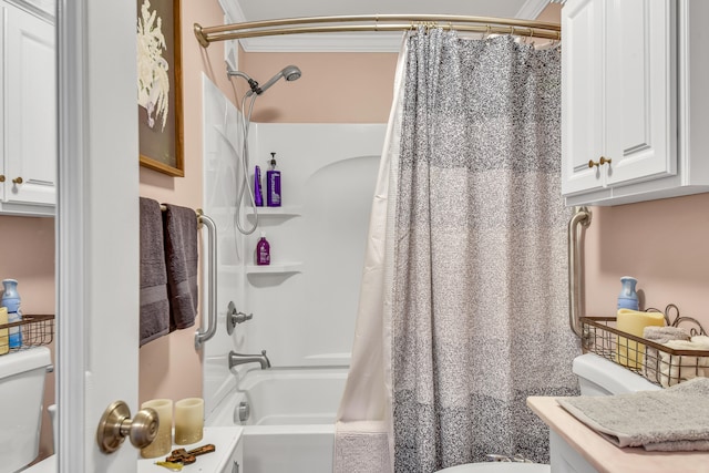 bathroom featuring crown molding, shower / bath combination with curtain, and toilet