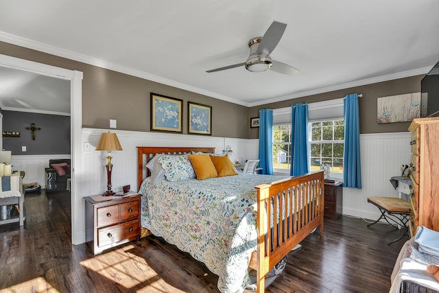 bedroom featuring ceiling fan, dark hardwood / wood-style floors, and crown molding