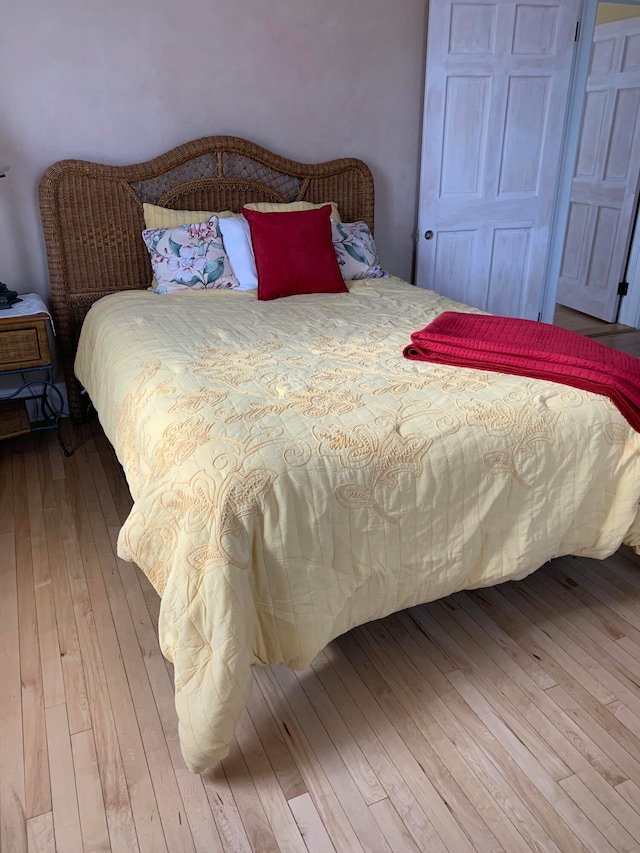 bedroom featuring hardwood / wood-style flooring