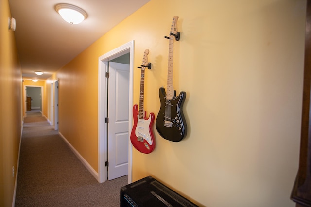 corridor with carpet flooring