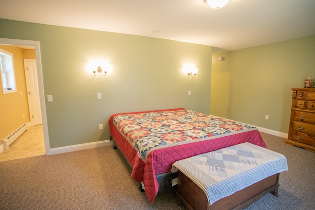 bedroom with carpet flooring and baseboard heating